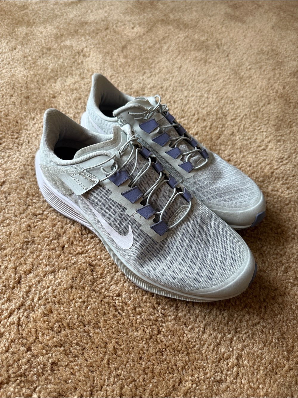 Nike Women’s Athletic Sneakers in Light Gray with Purple Accents